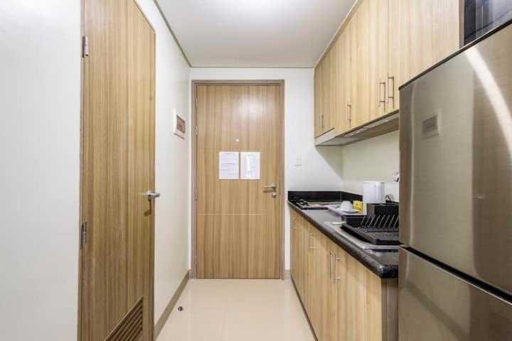 Shore 2 Residences 1Br Deluxe Room In Moa Complex Манила Екстериор снимка